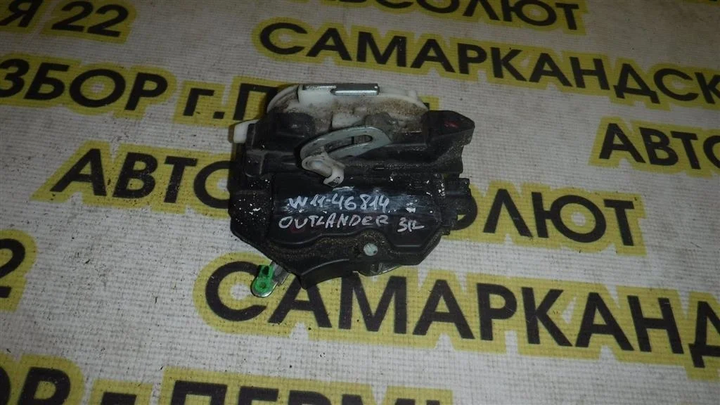 Замок двери задней левой Mitsubishi Outlander I (2002—2009)