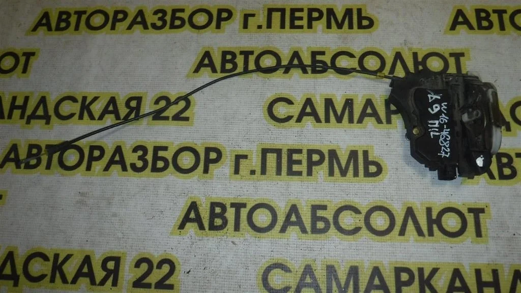 Замок двери передней левой Mitsubishi Lancer IX (2000—2007)