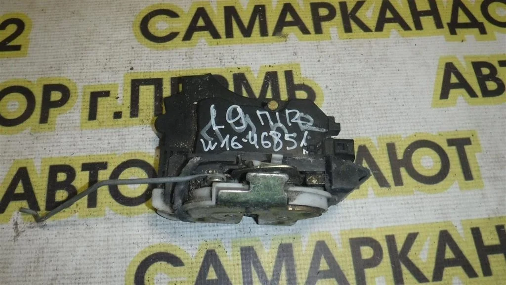 Замок двери передней правой Mitsubishi Lancer IX (2000—2007)