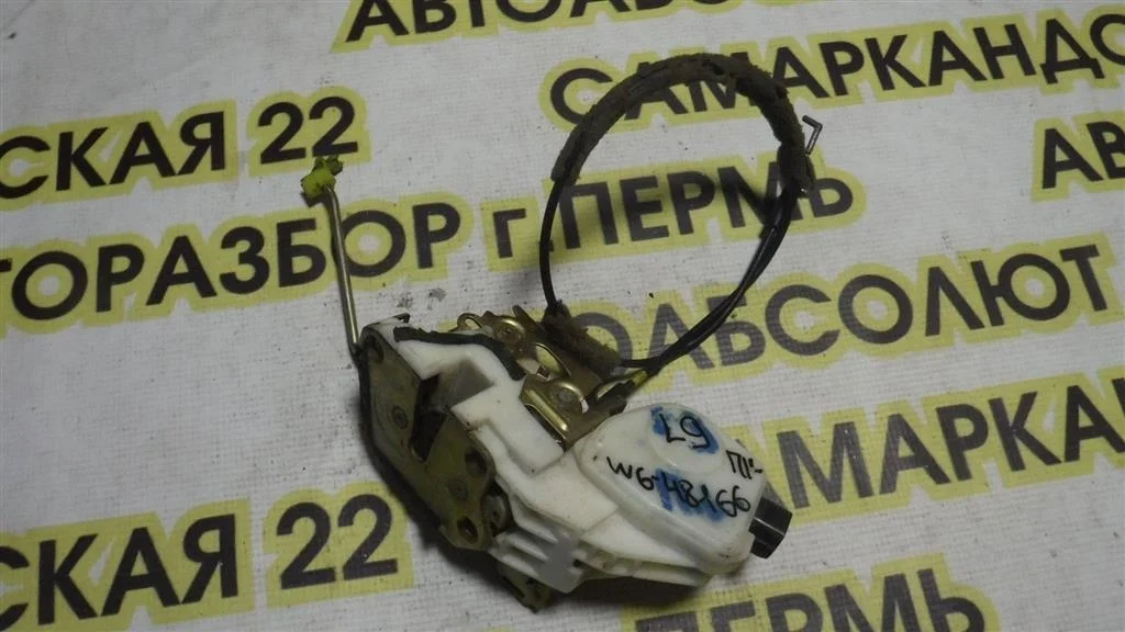 Замок двери передней левой Mitsubishi Lancer IX (2000—2007)