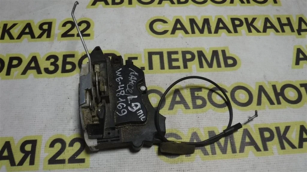 Замок двери передней левой Mitsubishi Lancer IX (2000—2007)