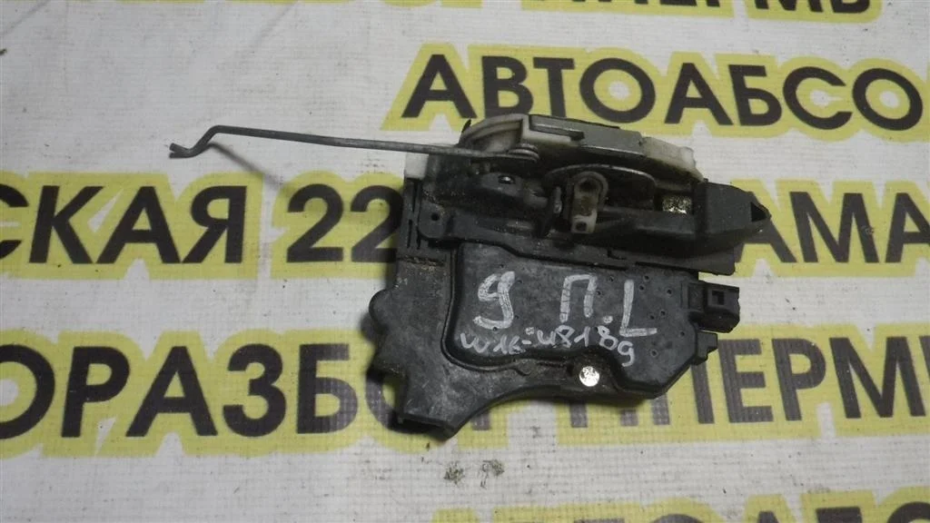 Замок двери передней левой Mitsubishi Lancer IX (2000—2007)