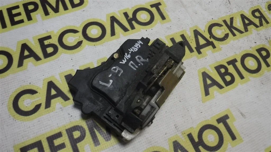 Замок двери передней правой Mitsubishi Lancer IX (2000—2007)