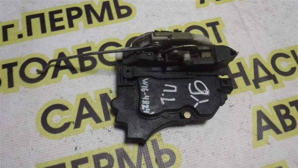 Замок двери передней левой Mitsubishi Lancer IX (2000—2007)