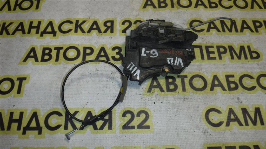 Замок двери передней левой Mitsubishi Lancer IX (2000—2007)