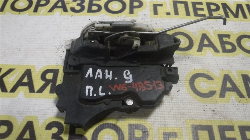 Замок двери передней левой Mitsubishi Lancer IX (2000—2007)