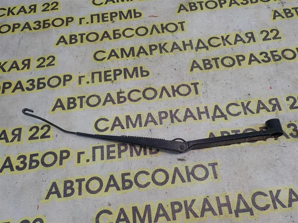 Поводок стеклоочистителя передний левый Mitsubishi Lancer IX (2000—2007)