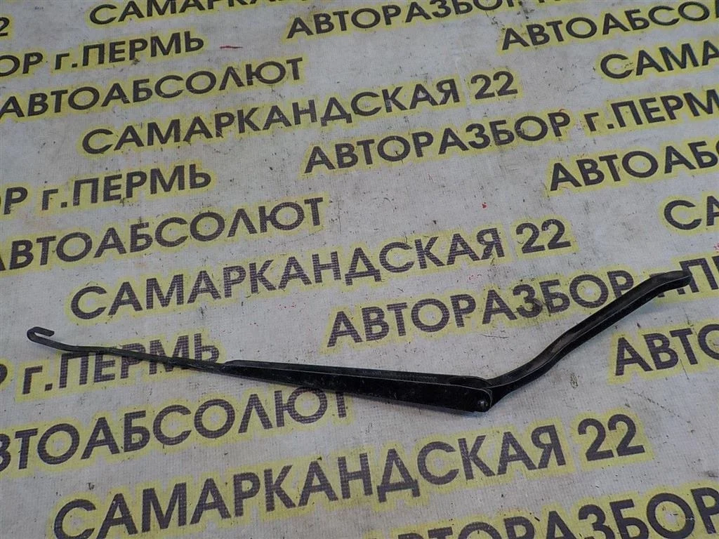 Поводок стеклоочистителя передний левый Mitsubishi Lancer IX (2000—2007)