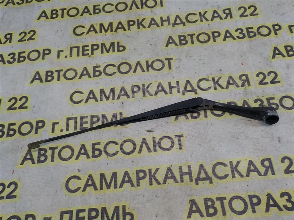 Поводок стеклоочистителя передний левый Mitsubishi Lancer IX (2000—2007)