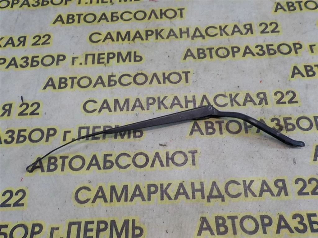 Поводок стеклоочистителя передний левый Mitsubishi Lancer IX (2000—2007)