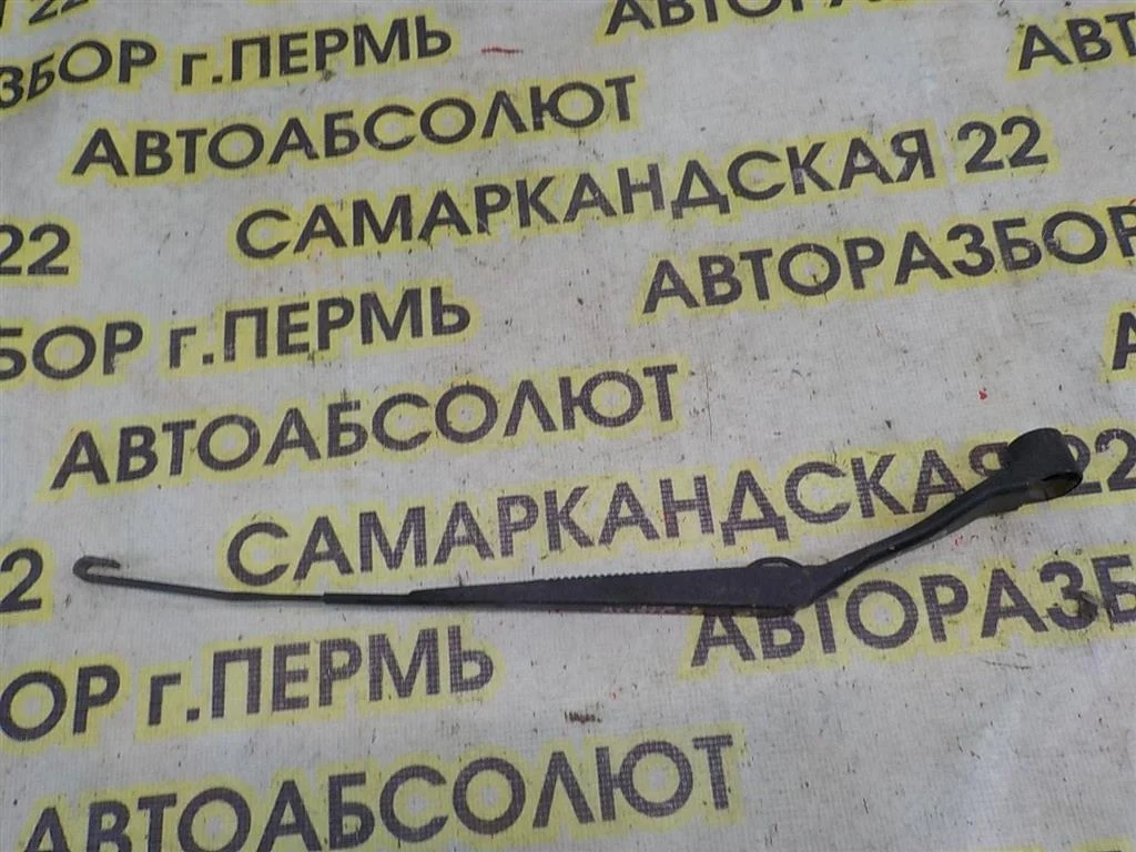 Поводок стеклоочистителя передний левый Mitsubishi Lancer IX (2000—2007)