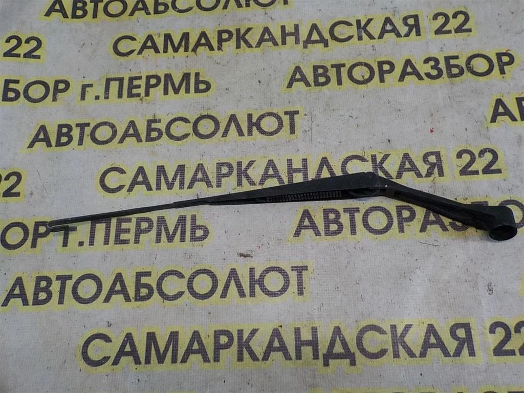 Поводок стеклоочистителя передний левый Mitsubishi Lancer IX (2000—2007)