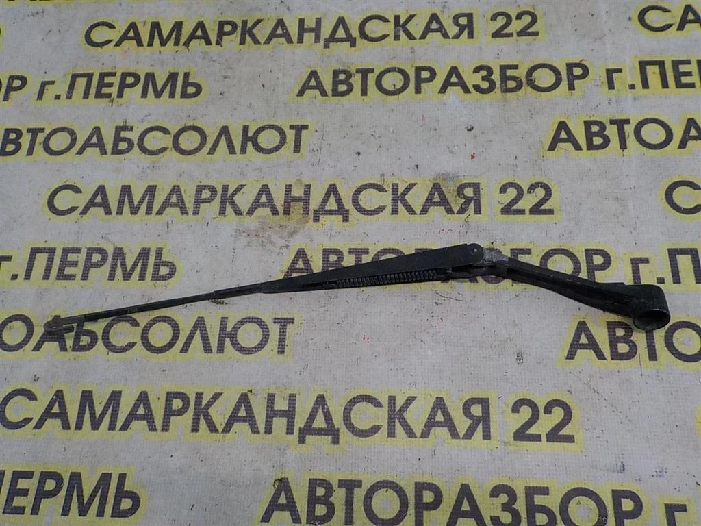 Поводок стеклоочистителя передний левый Mitsubishi Lancer IX (2000—2007)