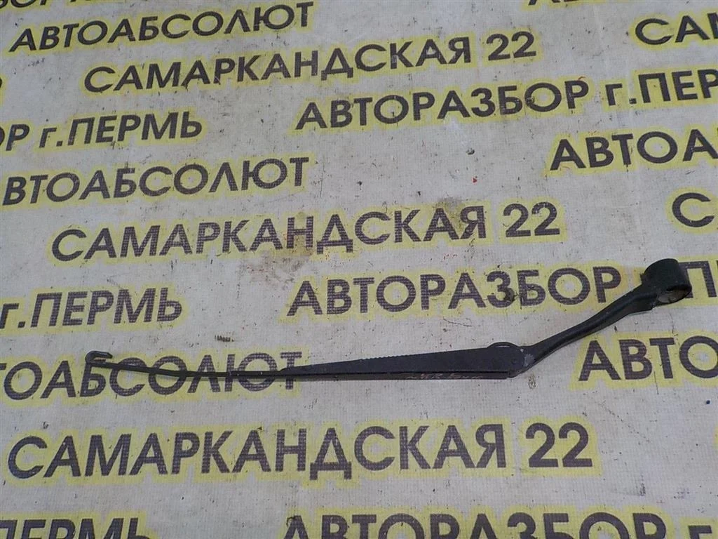 Поводок стеклоочистителя передний левый Mitsubishi Lancer IX (2000—2007)