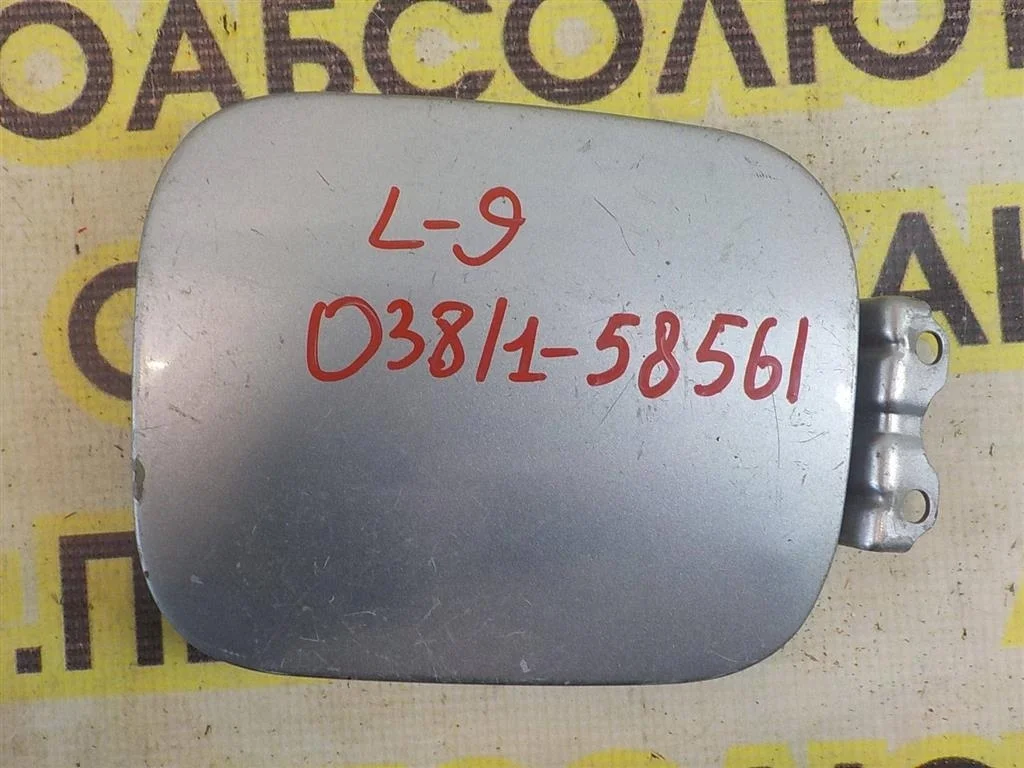 Лючок бензобака Mitsubishi Lancer IX (2000—2007)