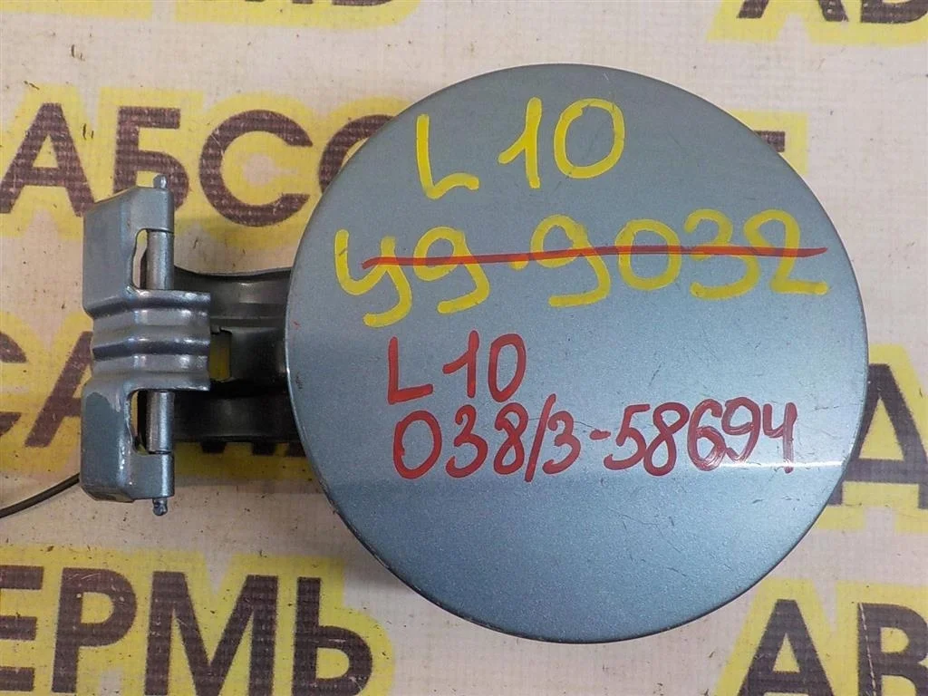 Лючок бензобака Mitsubishi Lancer X (2007—2010)