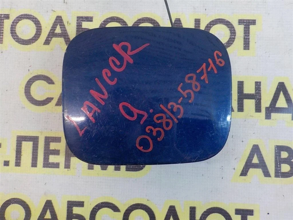 Лючок бензобака Mitsubishi Lancer IX (2000—2007)