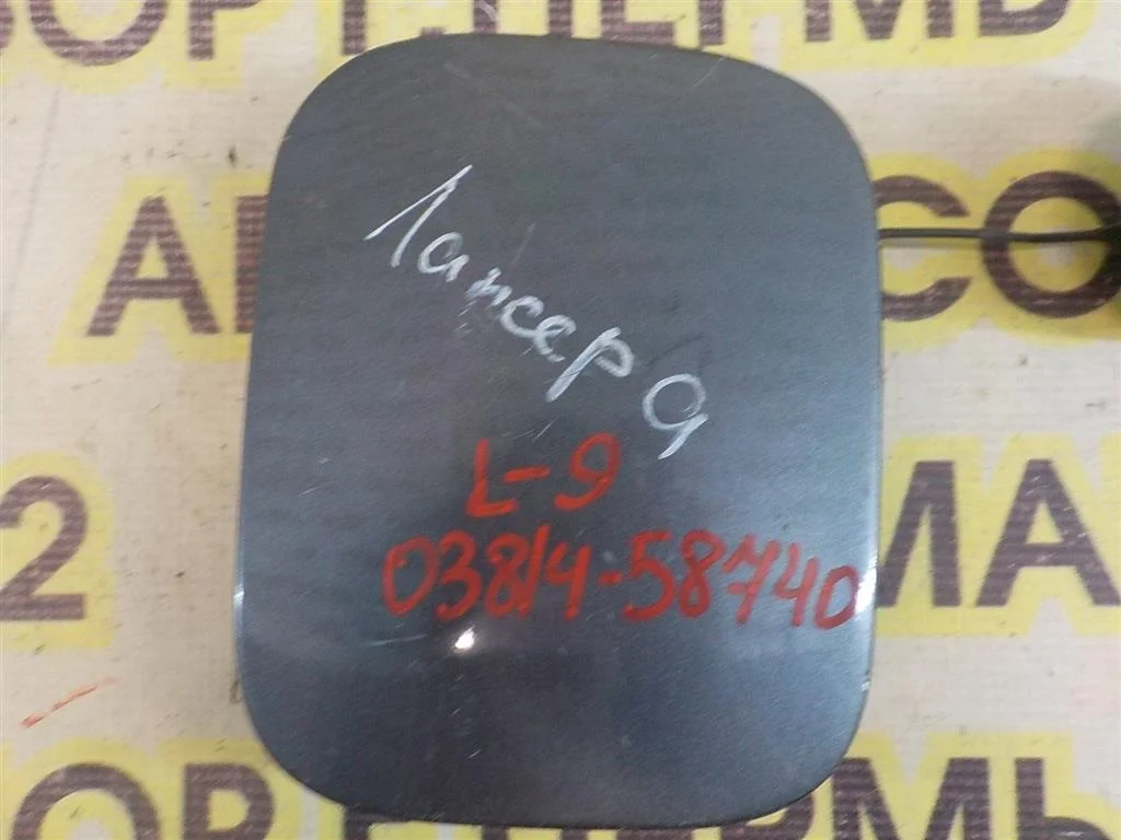 Лючок бензобака Mitsubishi Lancer IX (2000—2007)