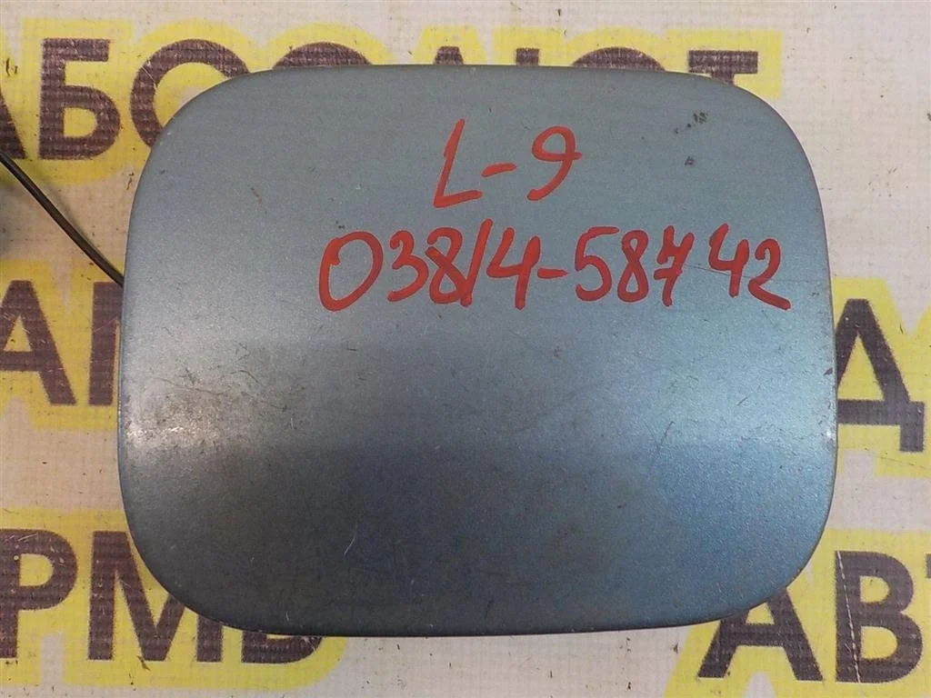 Лючок бензобака Mitsubishi Lancer IX (2000—2007)