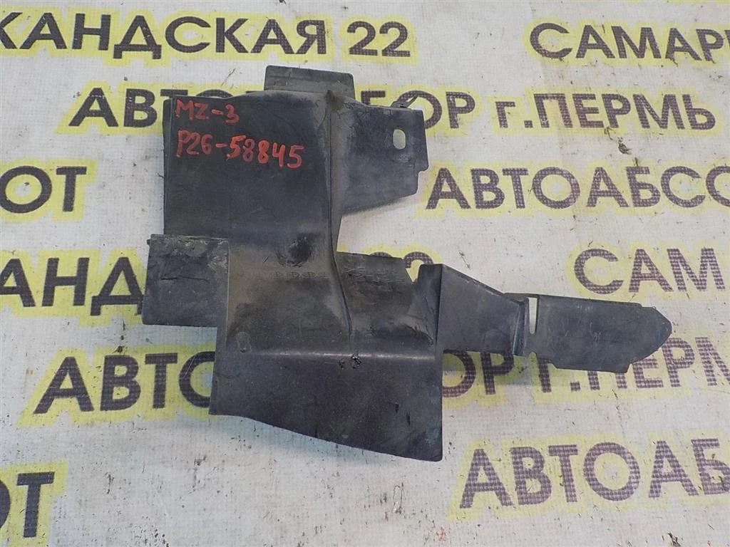 Кронштейн крепления дефлектора левый Mazda 3 BK (2003—2006)