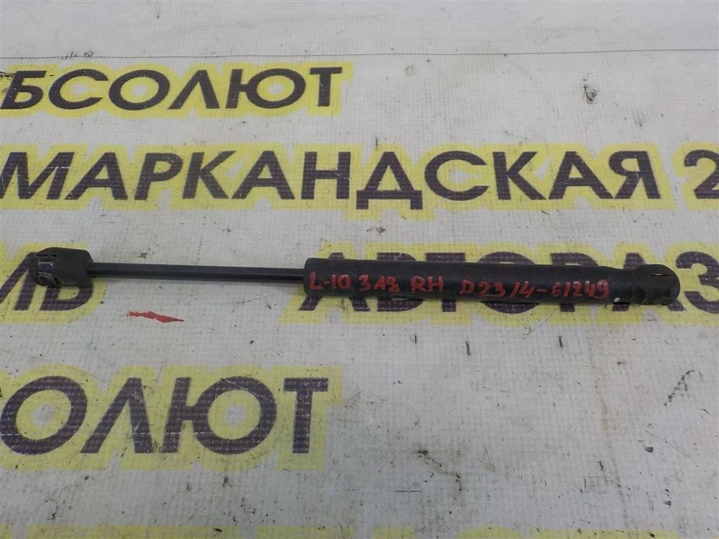 Амортизатор крышки багажника Mitsubishi Lancer X (2007—2010)