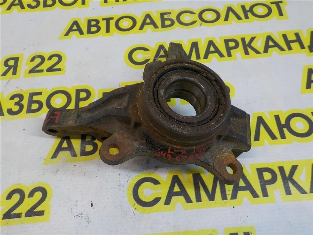 Кулак поворотный передний левый Mitsubishi Lancer X (2007—2010)