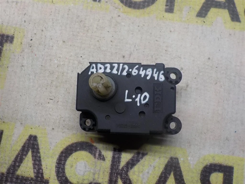 Моторчик заслонки печки Mitsubishi Lancer X (2007—2010)