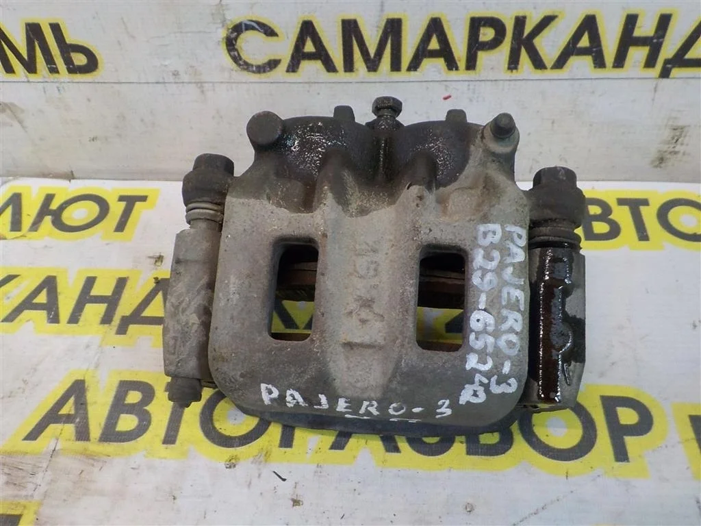 Суппорт передний правый Mitsubishi Pajero III (1999—2003)