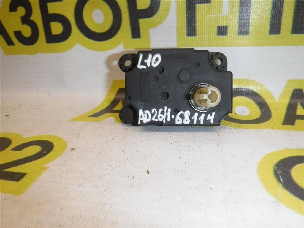 Моторчик заслонки печки Mitsubishi Lancer X (2007—2010)