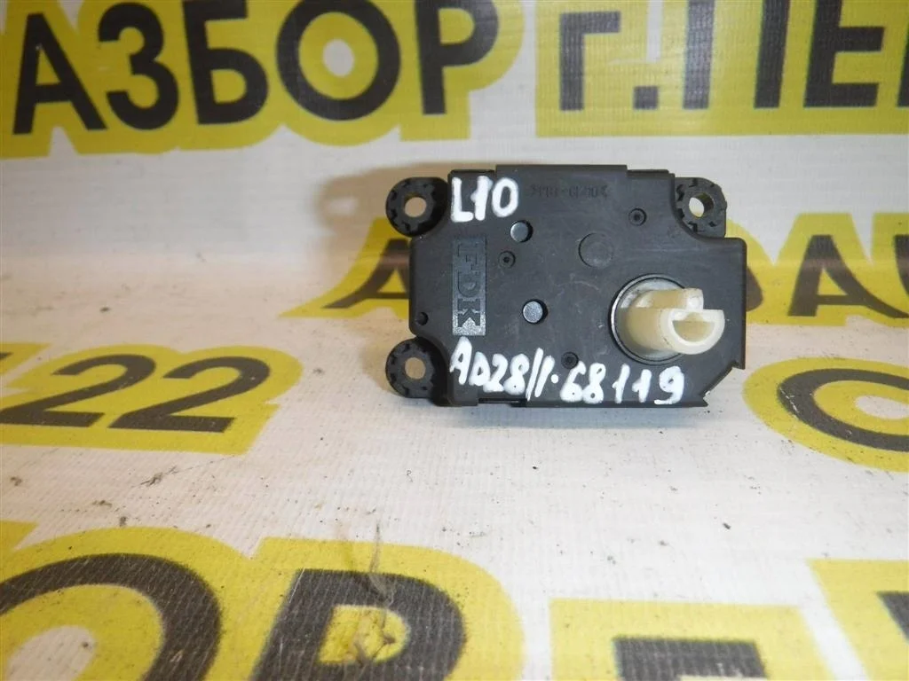 Моторчик заслонки печки Mitsubishi Lancer X (2007—2010)