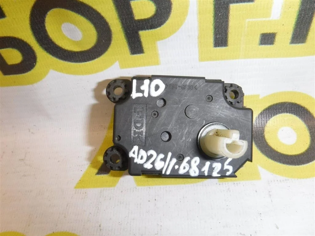 Моторчик заслонки печки Mitsubishi Lancer X (2007—2010)