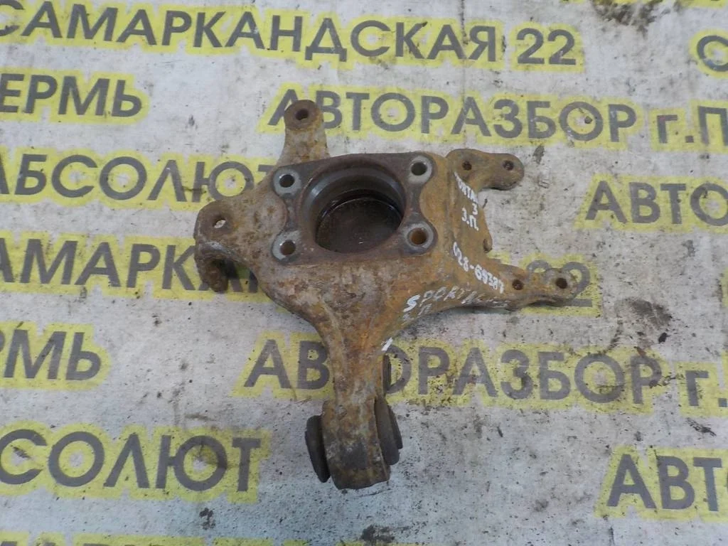 Кулак поворотный задний правый KIA Sportage III (2010—2014)