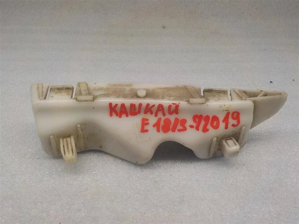 Кронштейн переднего бампера левый Nissan Qashqai I (2006—2010)