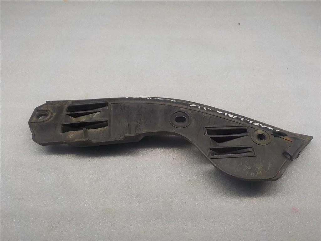 Кронштейн заднего бампера левый Volkswagen Touareg I (2002—2006)