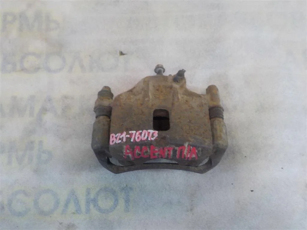 Суппорт передний левый Hyundai Accent II (1999—2012)