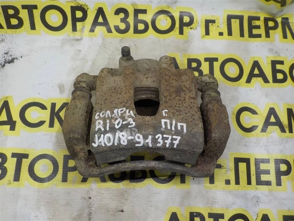 Суппорт передний правый KIA RIO III (2011—2015)