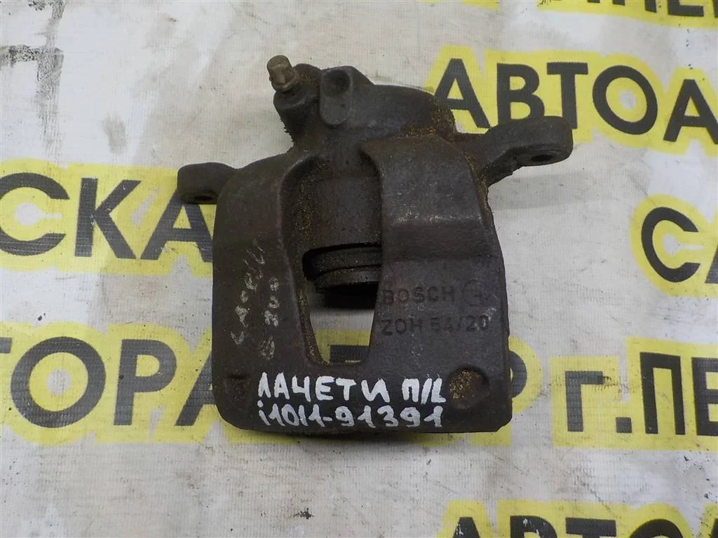 Суппорт передний левый Chevrolet Lacetti I (2004—2013)