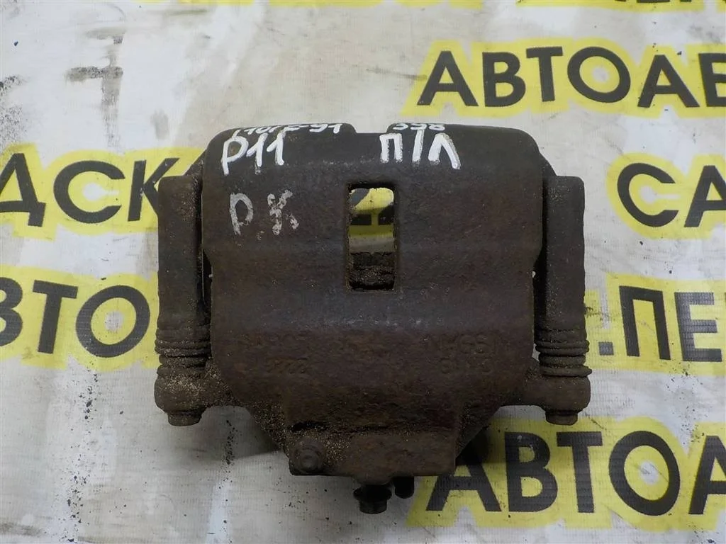 Суппорт передний левый Nissan Primera P11 (1995—2000)