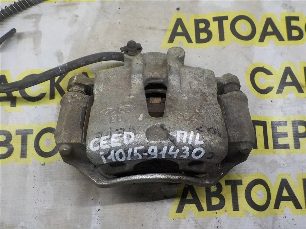 Суппорт передний левый KIA Ceed ED (2006—2010)