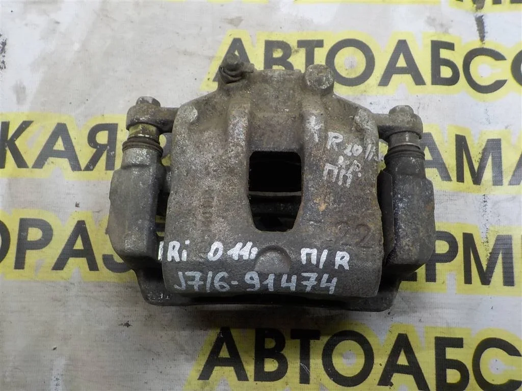 Суппорт передний правый KIA RIO III (2011—2015)