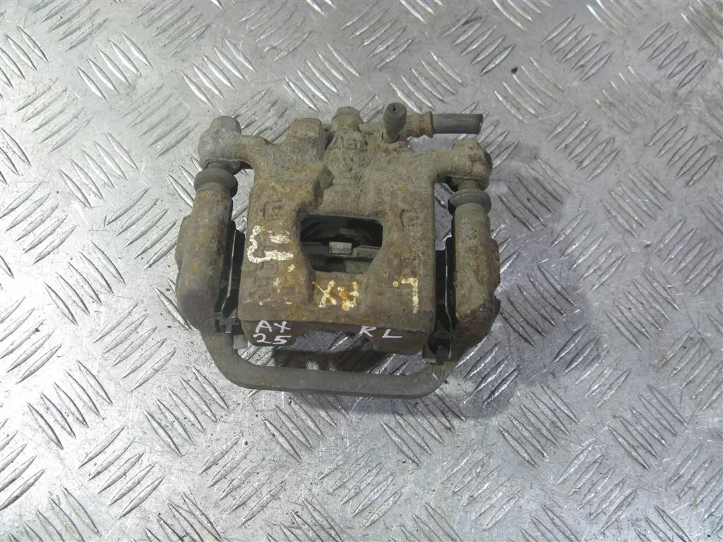 Суппорт задний левый NISSAN QASHQAI I (2006—2010)