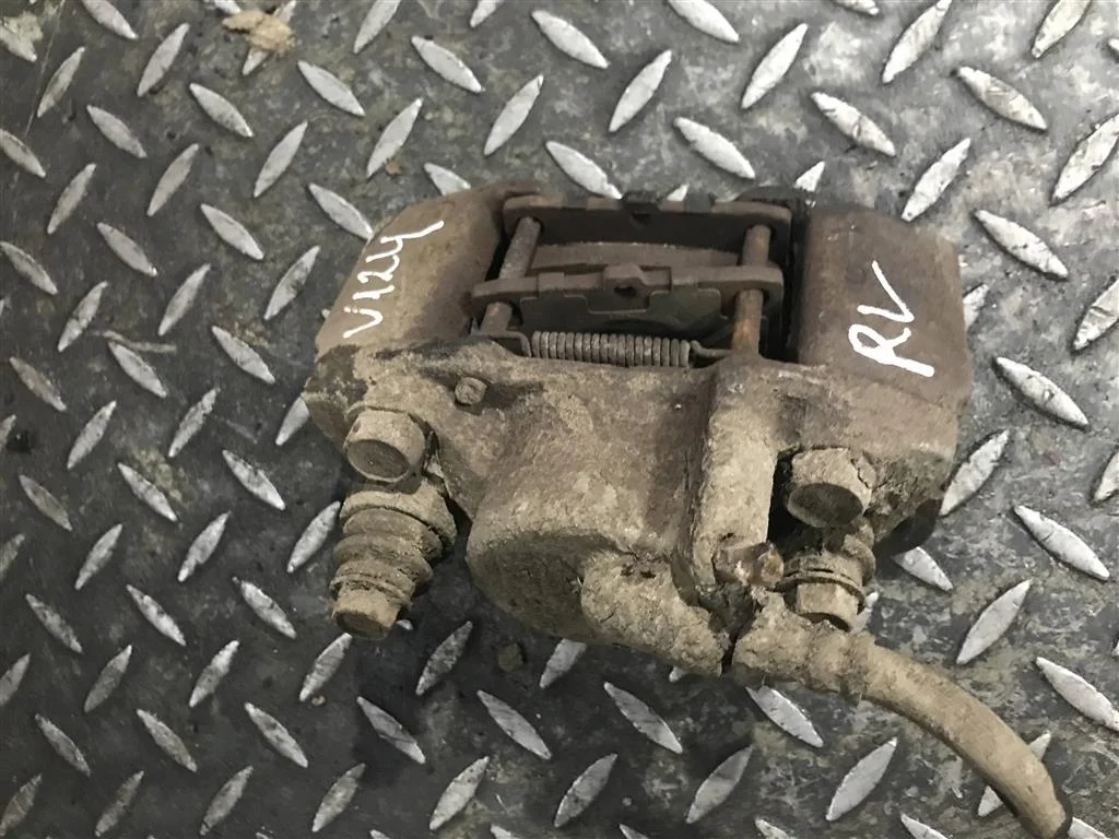 Суппорт задний левый MITSUBISHI PAJERO SPORT I ре