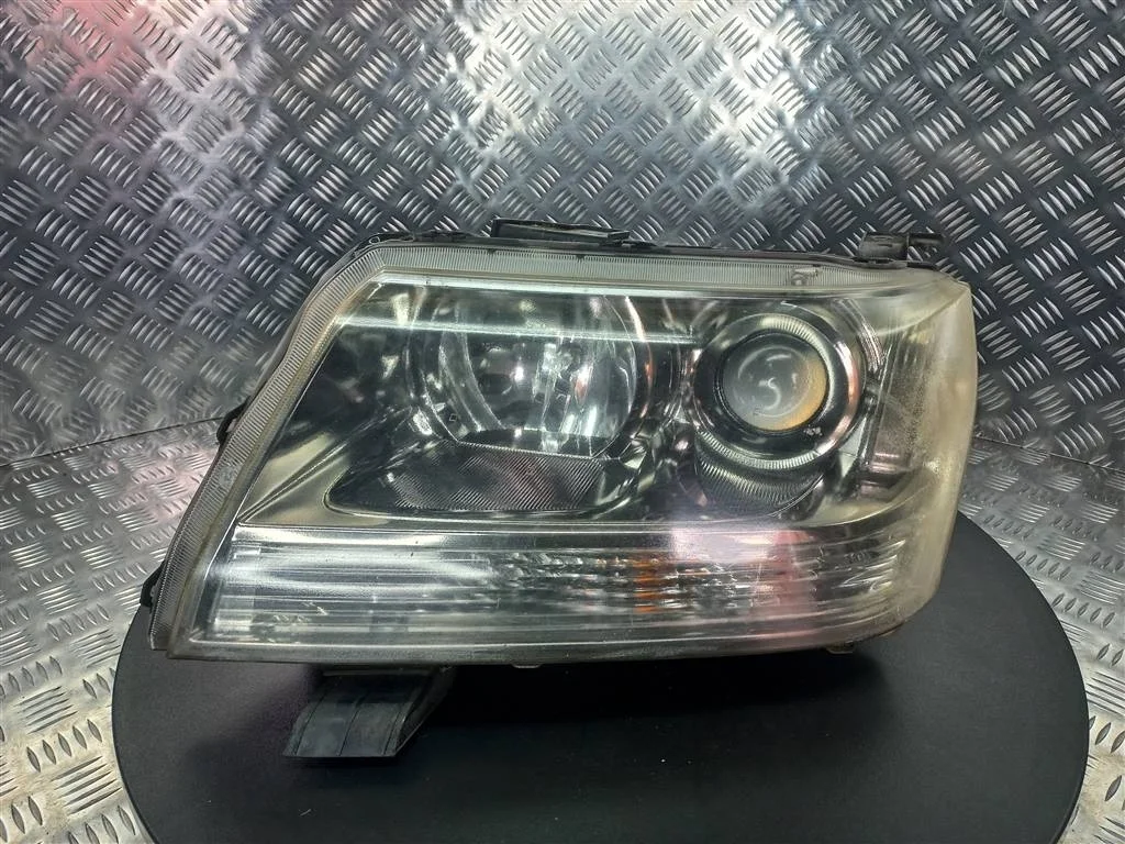 Фара передняя левая SUZUKI Grand Vitara II (2005—