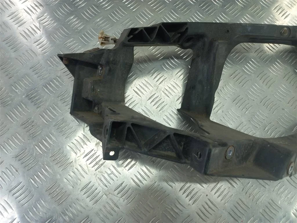 Кронштейн фары левой MITSUBISHI COLT Z30 (2002—20