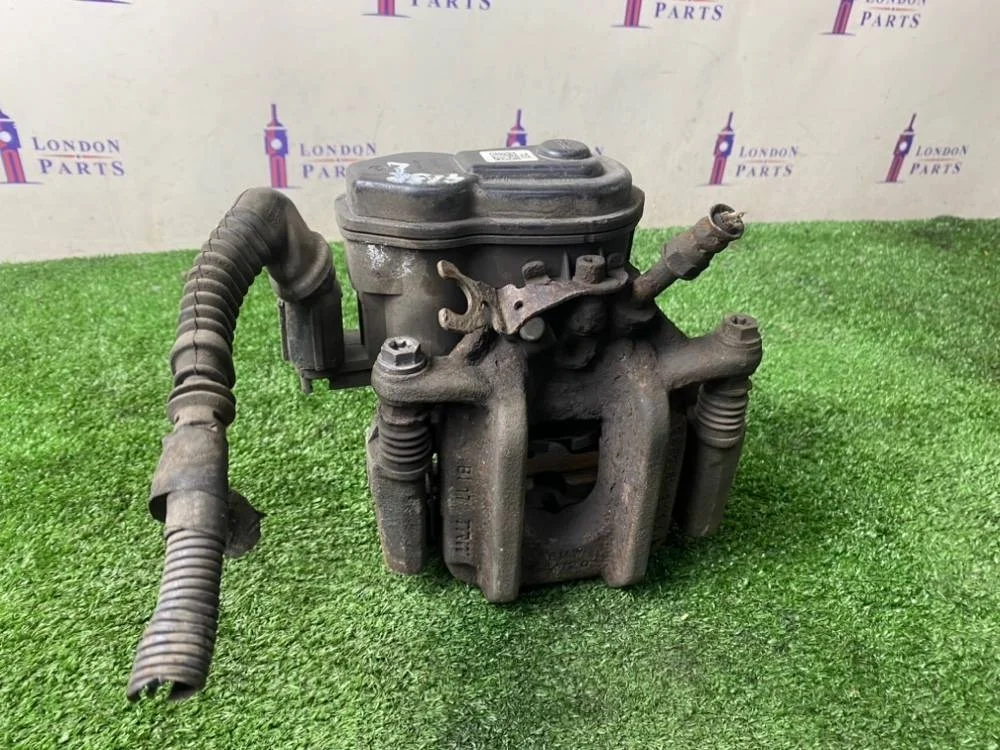 Суппорт тормозной BMW X3 .0si F25