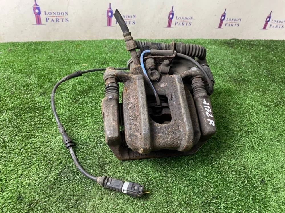 Суппорт тормозной BMW 520D F10