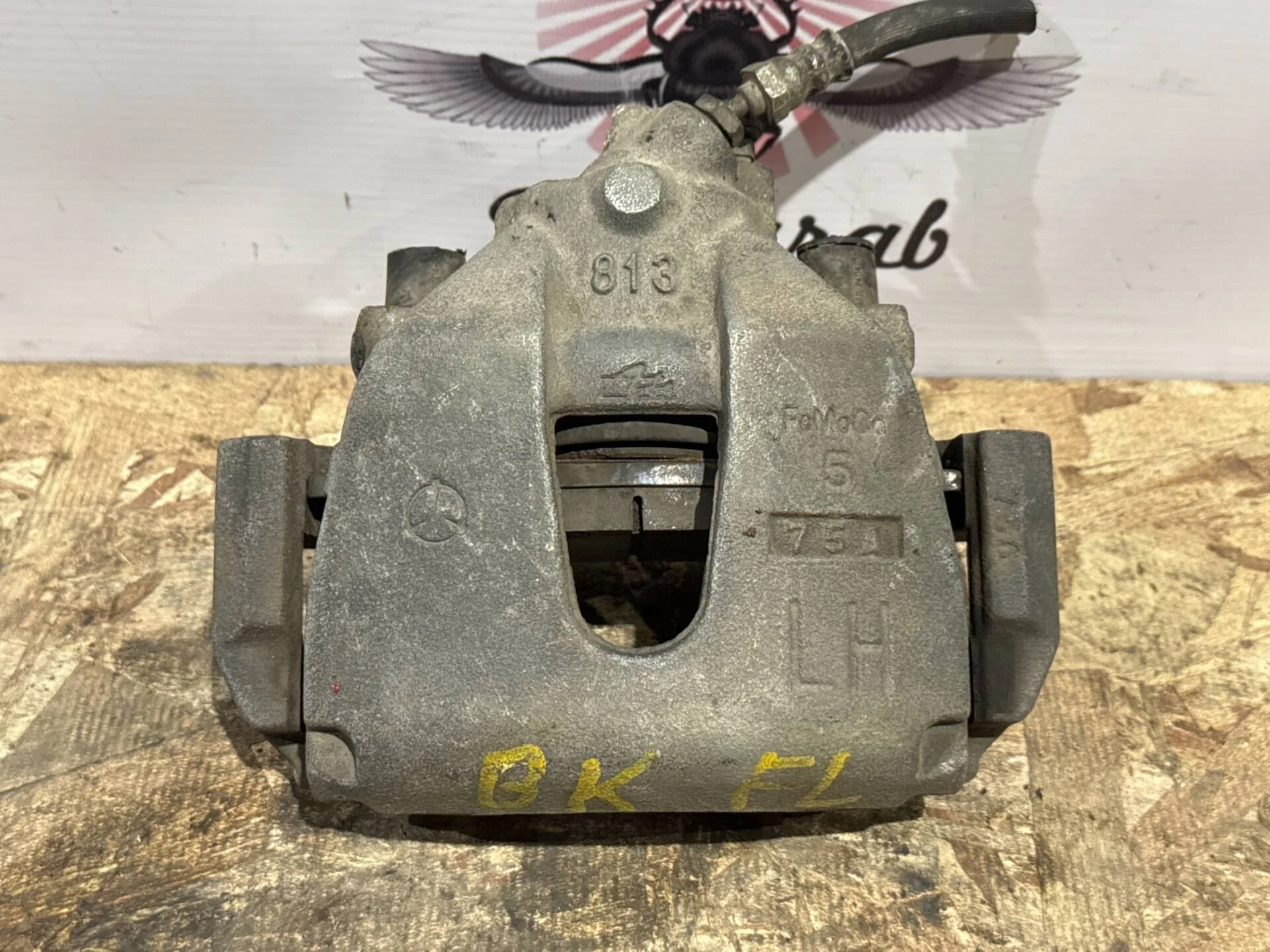 Суппорт передний левый Mazda 3 BK