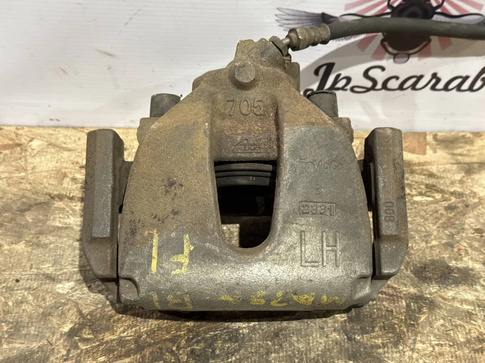 Суппорт передний левый Mazda 3 BL