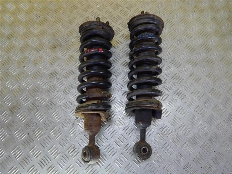 Амортизатор передний левый Nissan Navara (D40) 2004-2015 2008 56100EB37E 2.5 D YD25DDTI