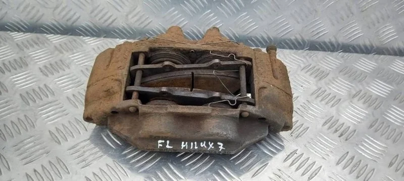 Суппорт передний левый Toyota Hilux (2005-2015) 2010 477500K180 2.5 D 2KDFTV